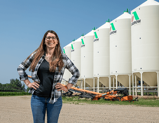 Women-Farm-Equipment-Rural-Summit-Homepage-Callout Women standing in front of farm equipment